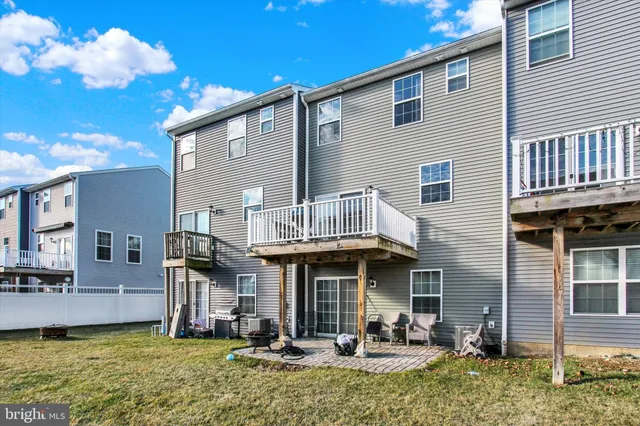 a front view of a house with patio