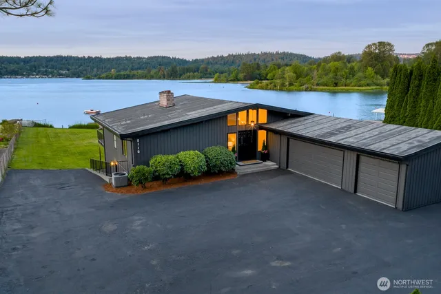 a view of a terrace with a lake view