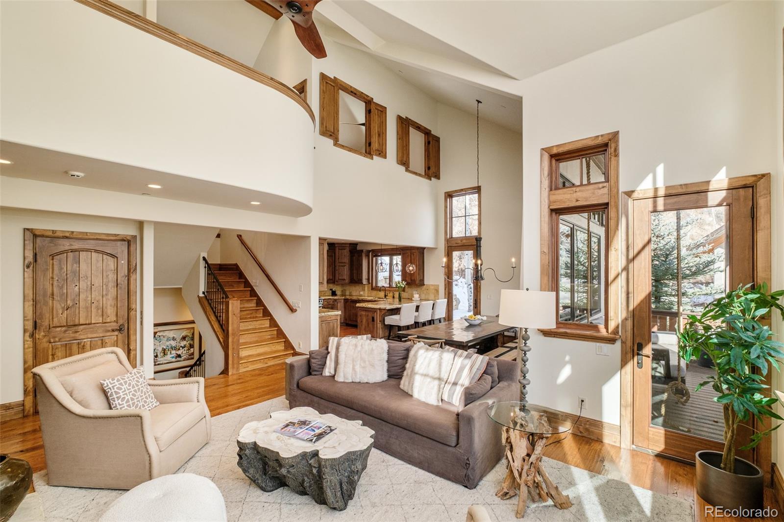 2417 Garmisch Drive, Unit B Vail, CO 81657 - Photo 15 of 43 a living room with furniture and a large window
