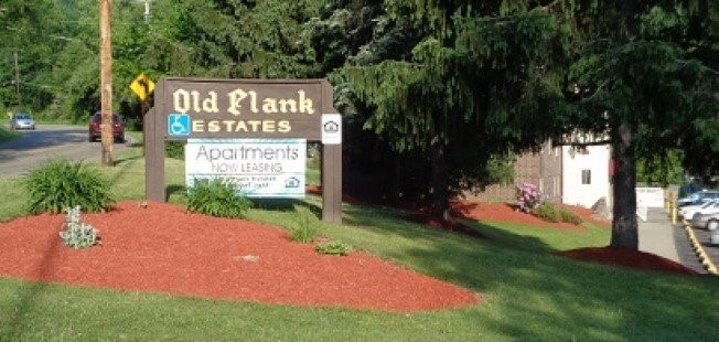 152 Old Plank Road Butler, PA 16002 - Photo 4 of 7 a sign board with yard in front of it
