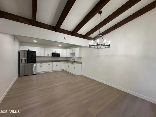a view of a kitchen with a sink