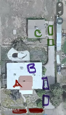 an aerial view of a house with yard