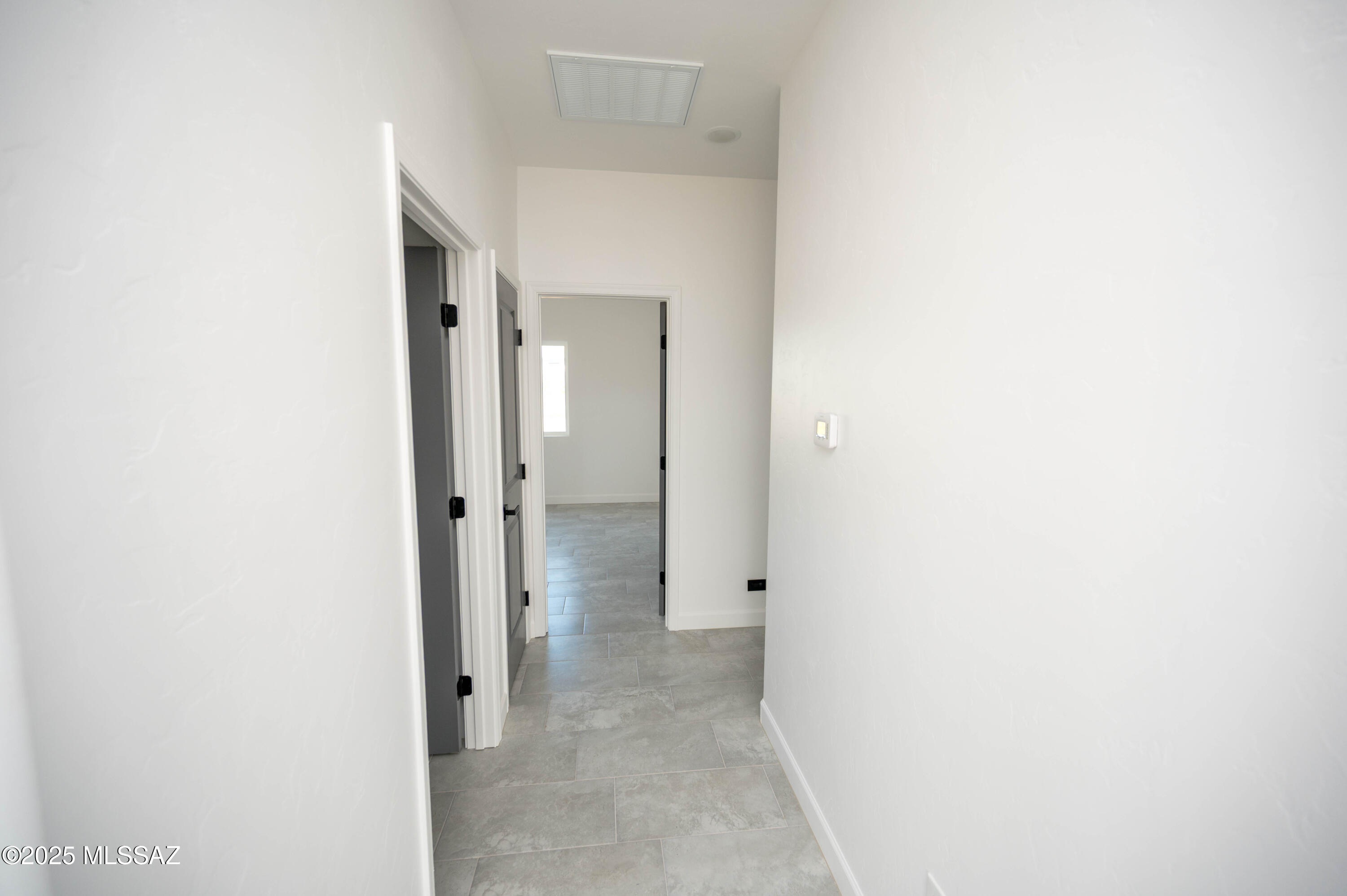 1781 Elder Court Rio Rico, AZ 85648 - Photo 50 of 50 a view of a hallway with closet and bathroom