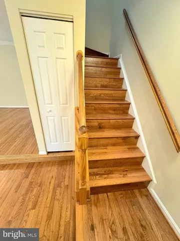 a view of entryway with wooden floor