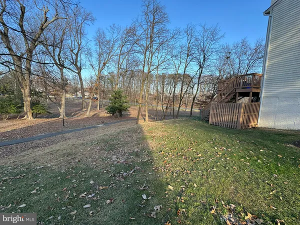 a view of building with car parked