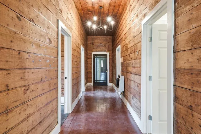 a view of a brick house with a large window