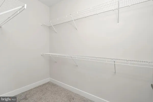 a view of a room with racks on the wall