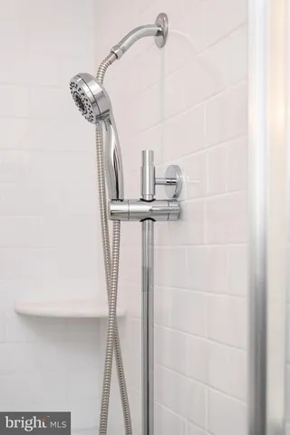 a black and white photo of a black gate