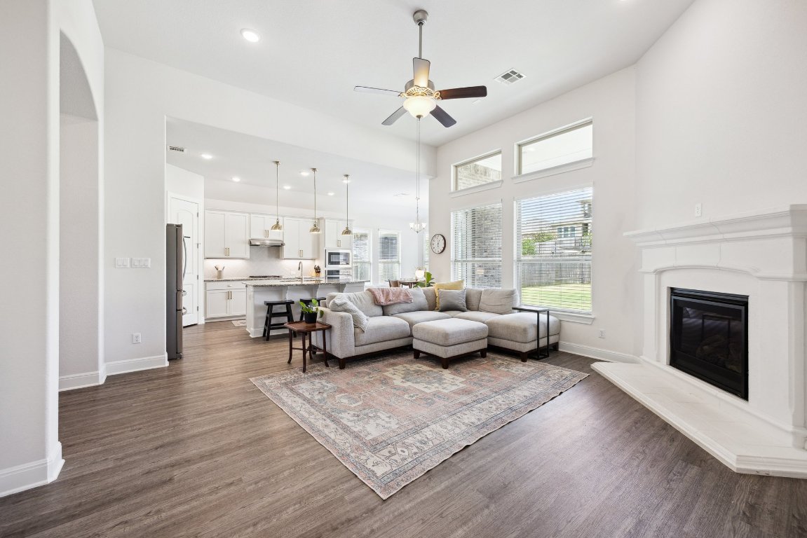 744 Founders Ridge Dripping Springs, TX 78620 - Photo 17 of 32 a living room with furniture and a fireplace
