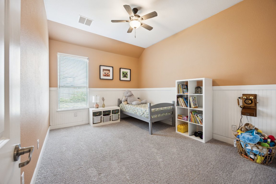 744 Founders Ridge Dripping Springs, TX 78620 - Photo 23 of 32 a view of a livingroom with furniture and toys