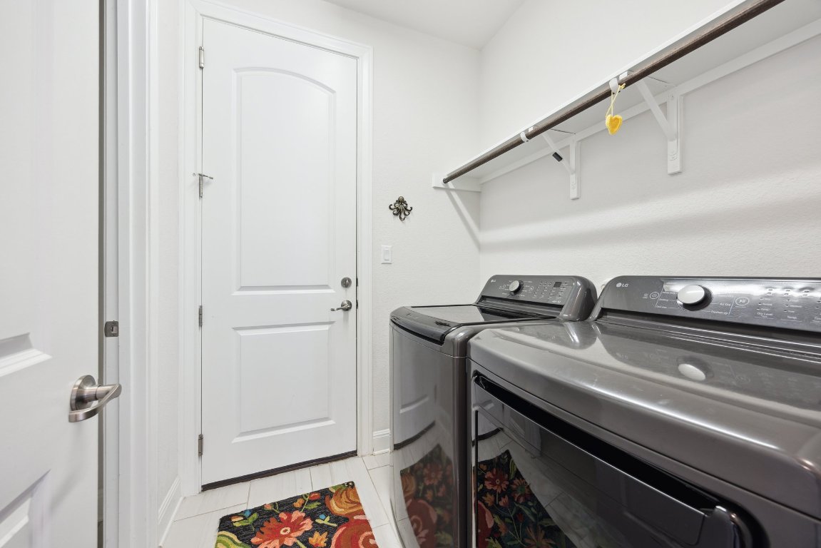 744 Founders Ridge Dripping Springs, TX 78620 - Photo 25 of 32 a utility room with dryer and washer