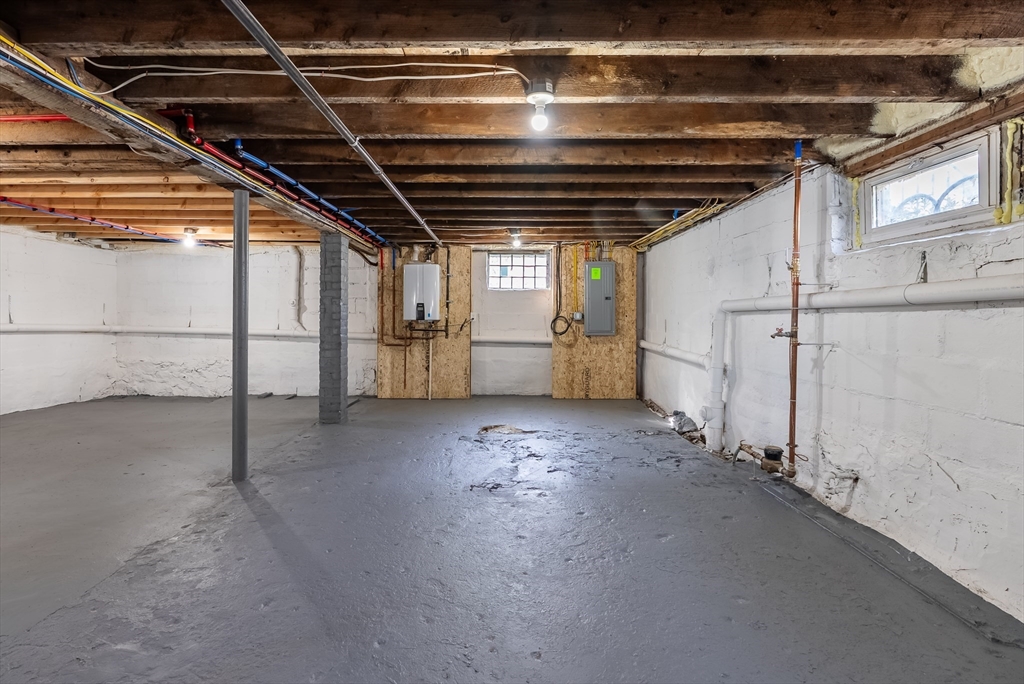 153 Ray Street Fall River, MA 02720 - Photo 21 of 29 a view of a room with racks on the wall
