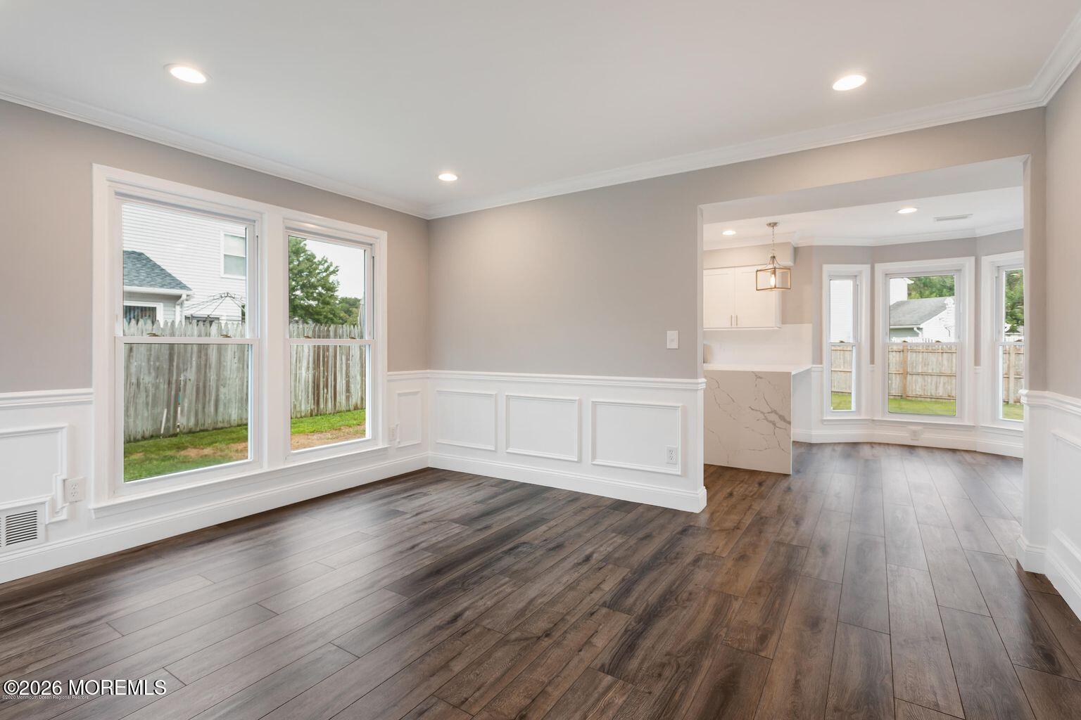 23 Sami Drive Howell, NJ 07731 - Photo 24 of 26 a view of an empty room with wooden floor and a window
