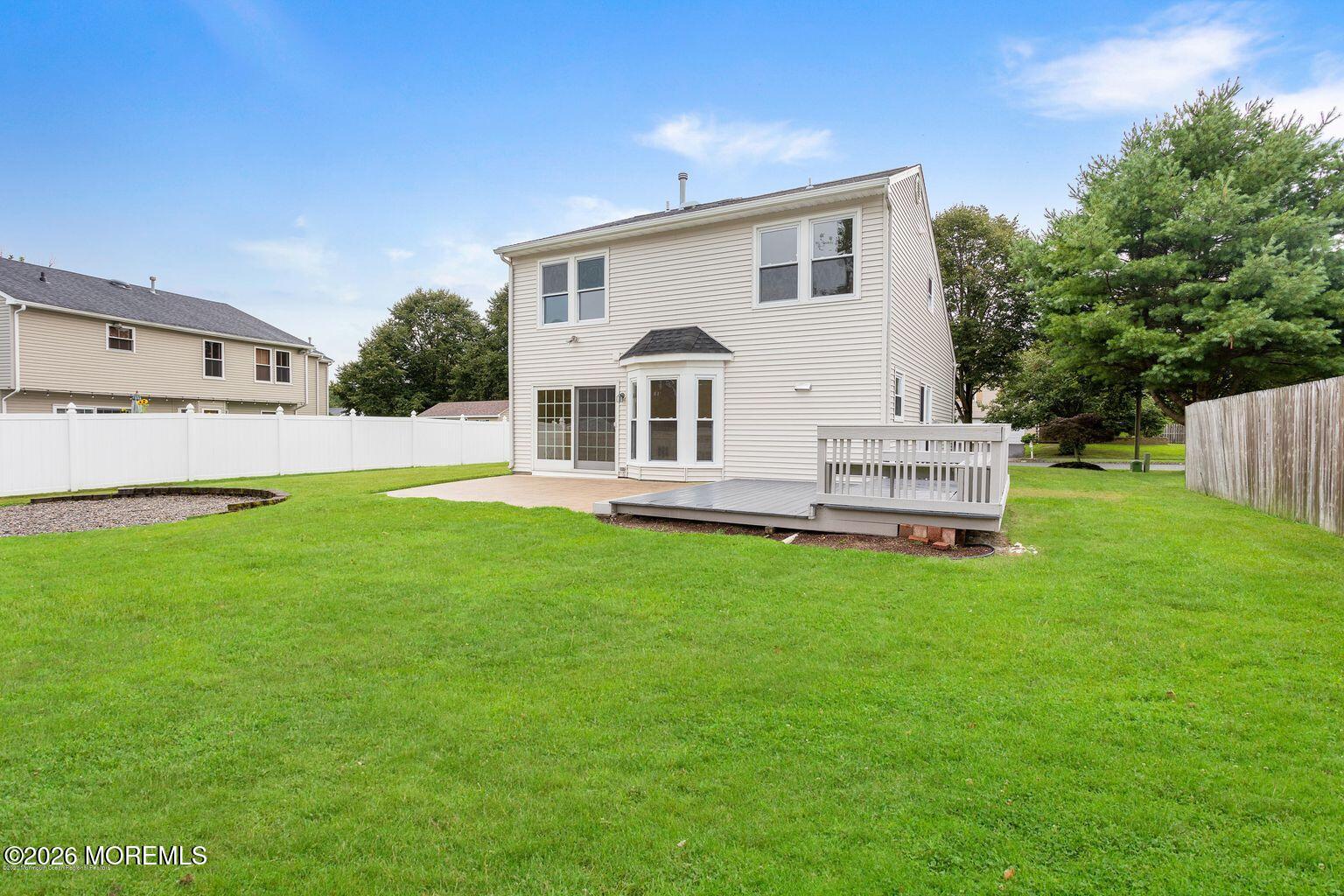23 Sami Drive Howell, NJ 07731 - Photo 25 of 26 a view of a house with a backyard