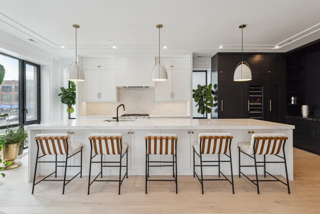 a dinning area with furniture and window