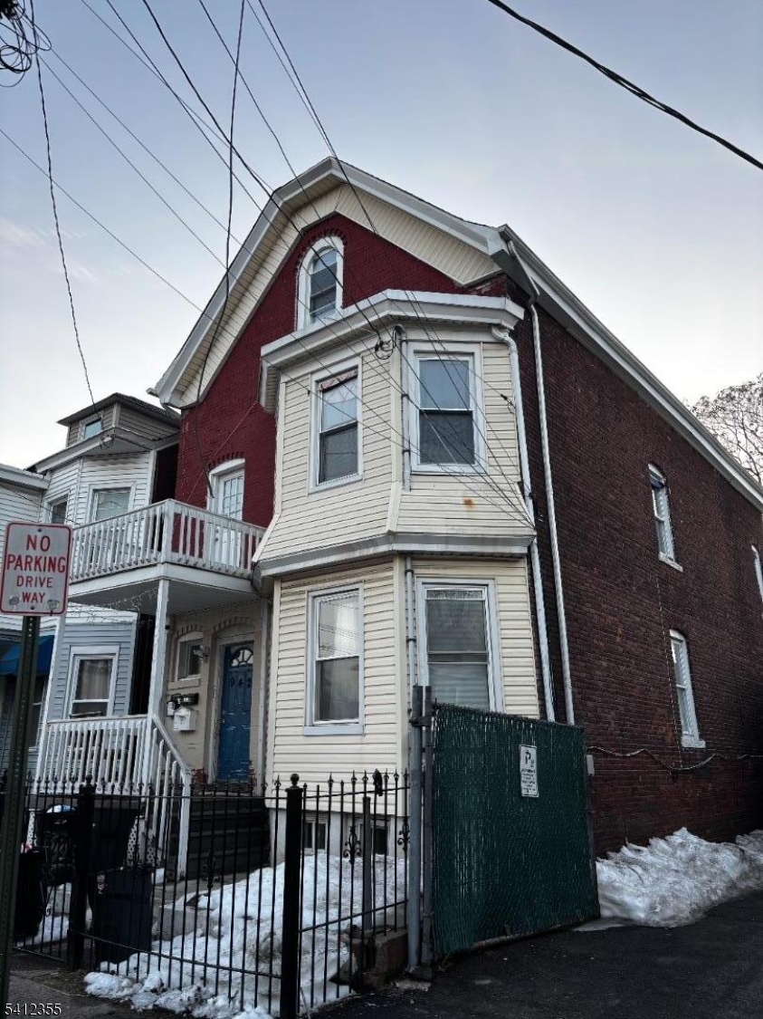 942 East 19th Street Paterson, NJ 07501 - Photo 1 of 26 a front view of a house