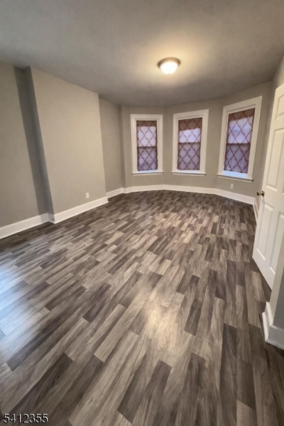 942 East 19th Street Paterson, NJ 07501 - Photo 12 of 26 a view of an empty room and window