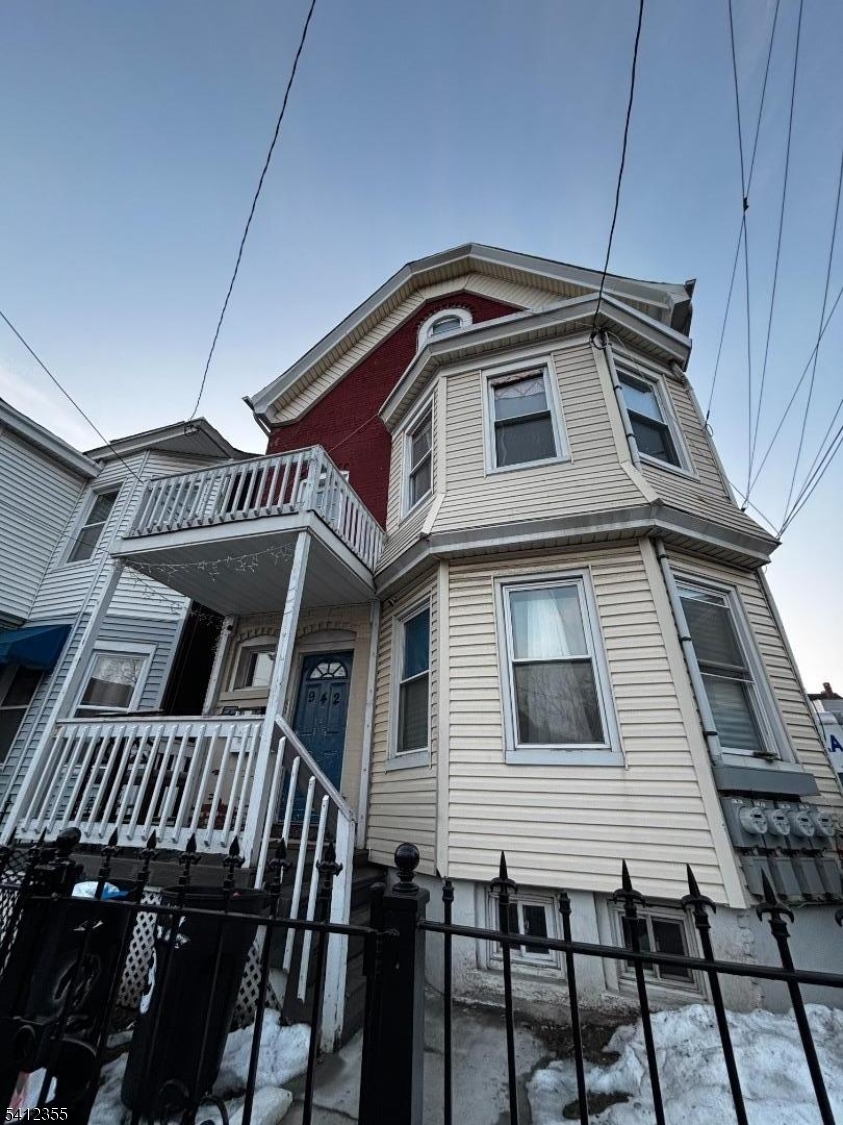 942 East 19th Street Paterson, NJ 07501 - Photo 2 of 26 a front view of a house