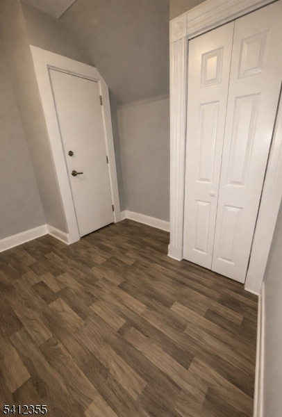 942 East 19th Street Paterson, NJ 07501 - Photo 23 of 26 a view of an empty room with wooden floor