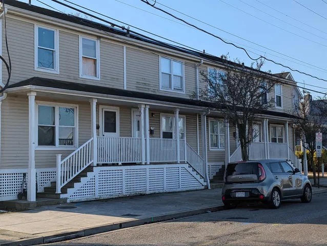 a car parked in front of a building