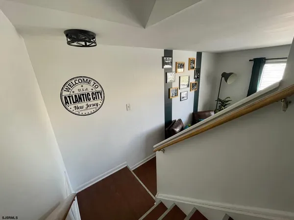 a view of entryway with a front door