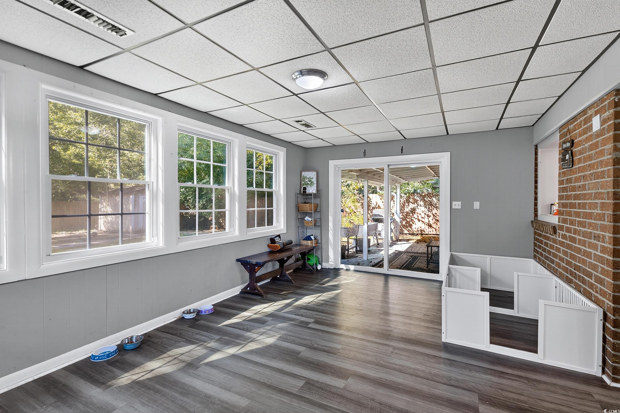 342 Red Fox Road Myrtle Beach, SC 29579 - Photo 21 of 40 Exercise room with a paneled ceiling and wood finished floors