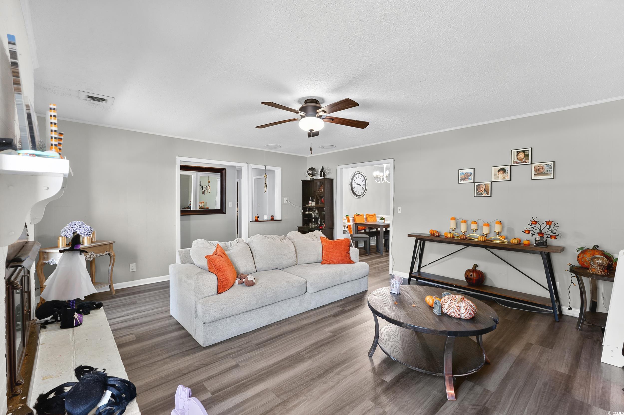 342 Red Fox Road Myrtle Beach, SC 29579 - Photo 5 of 40 Living room featuring wood finished floors and ceiling fan