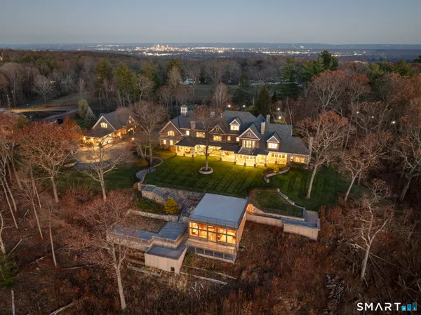 a view of a chairs and table in patio
