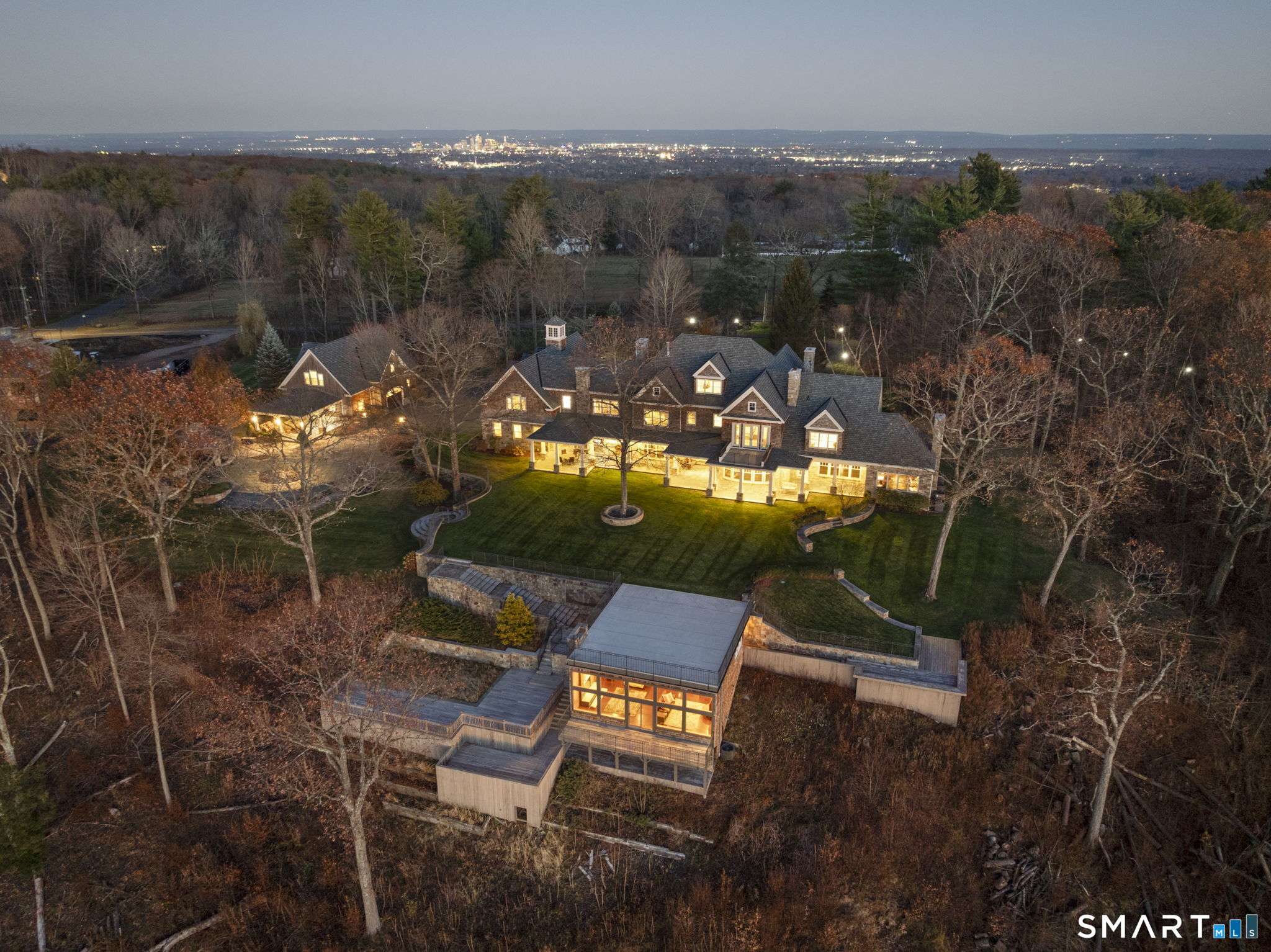 a view of a chairs and table in patio