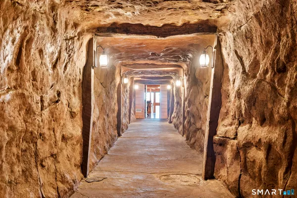 a view of a hallway with staircase