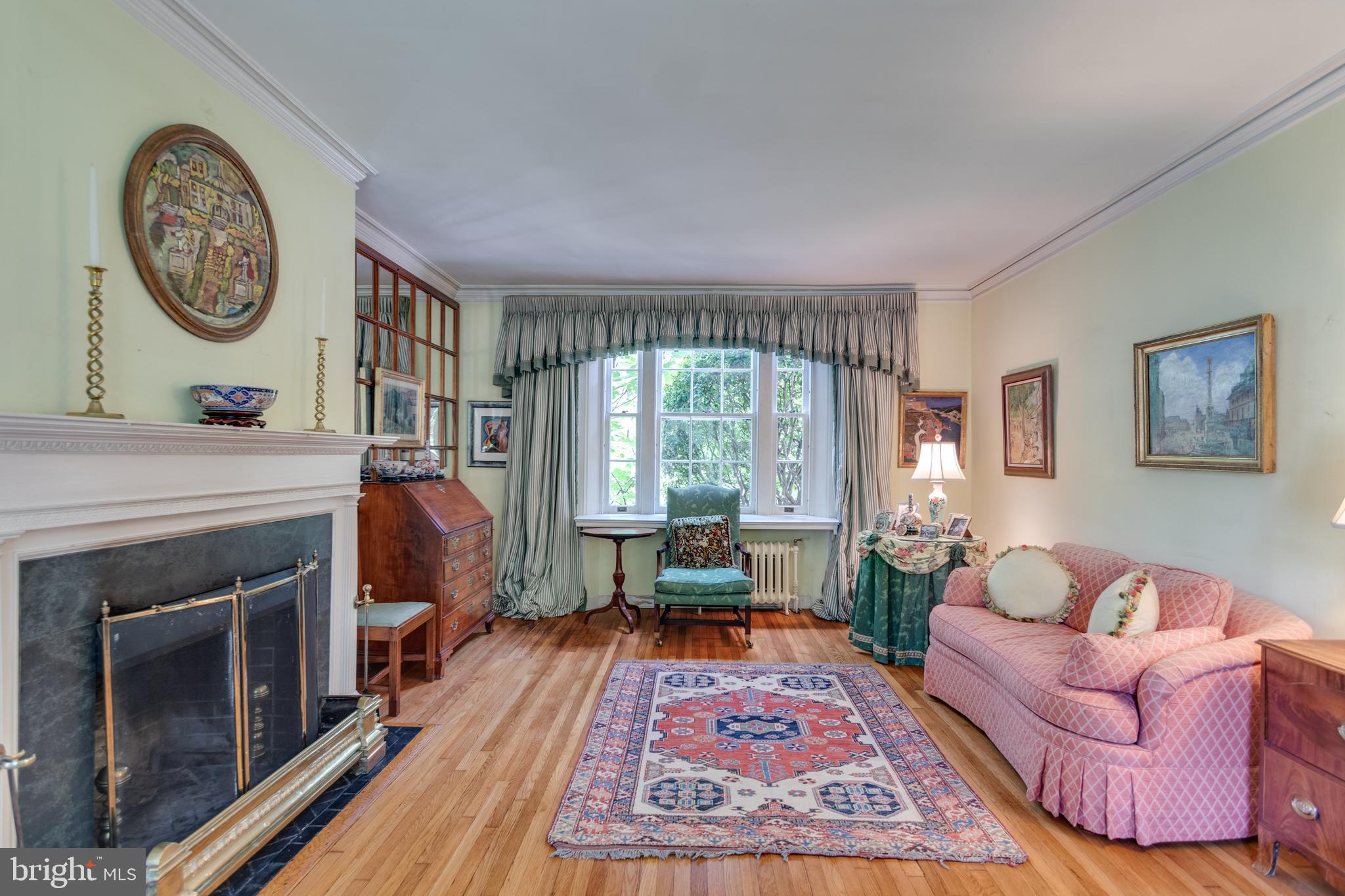 206 North View Terrace Alexandria, VA 22301 - Photo 11 of 37 a living room with furniture a large window and a fireplace