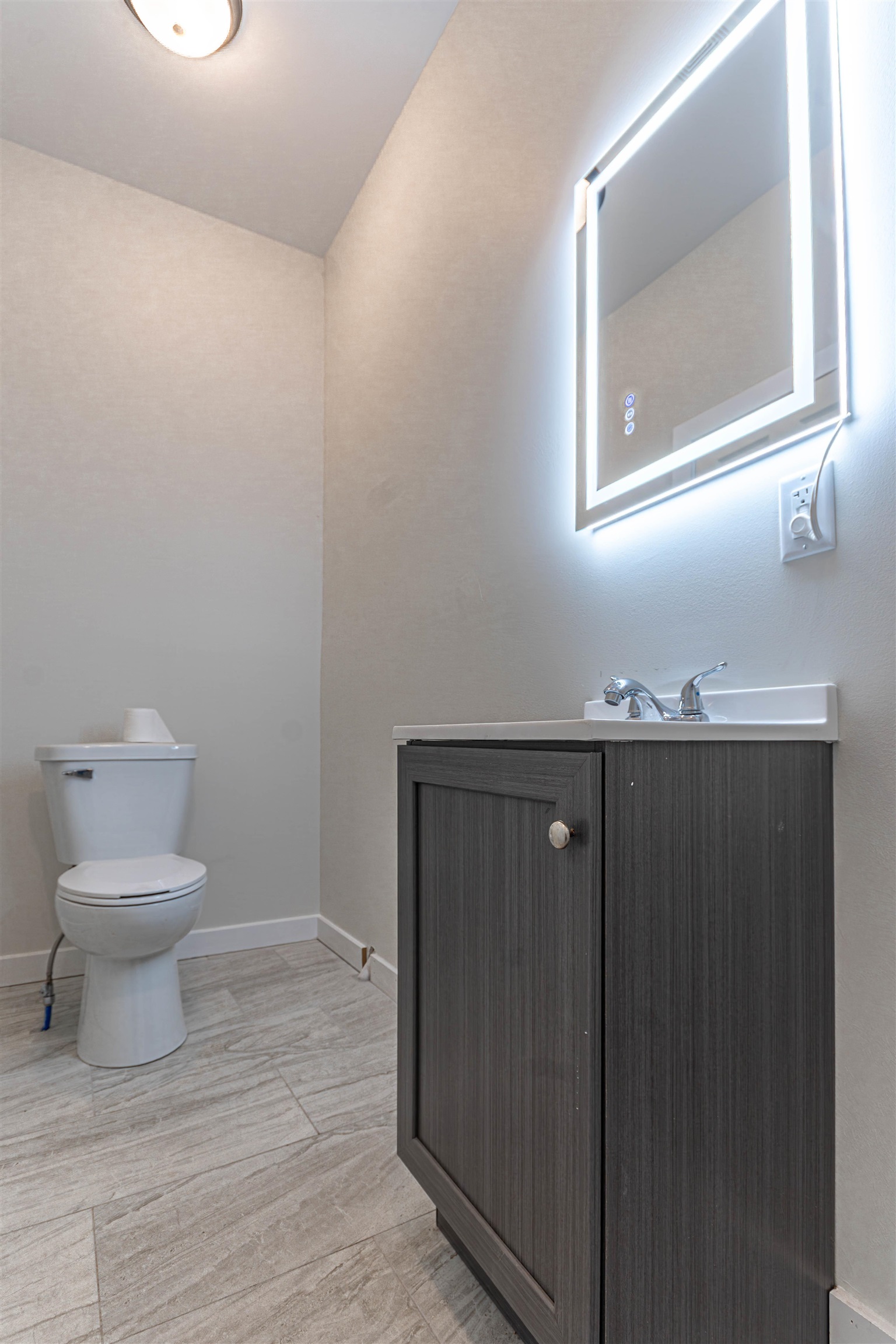 407 Allen Street Belvidere, IL 61008 - Photo 17 of 32 a bathroom with a toilet a sink and mirror