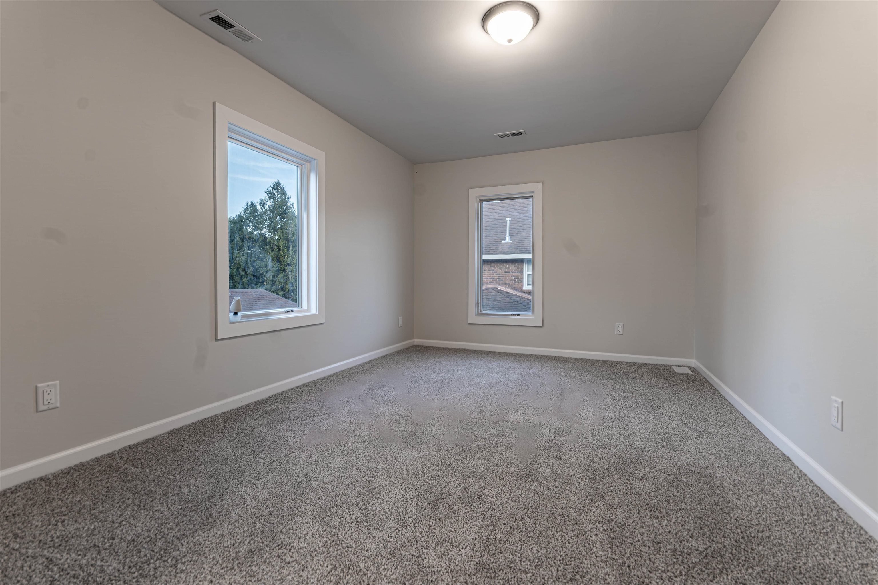 407 Allen Street Belvidere, IL 61008 - Photo 23 of 32 an empty room with windows