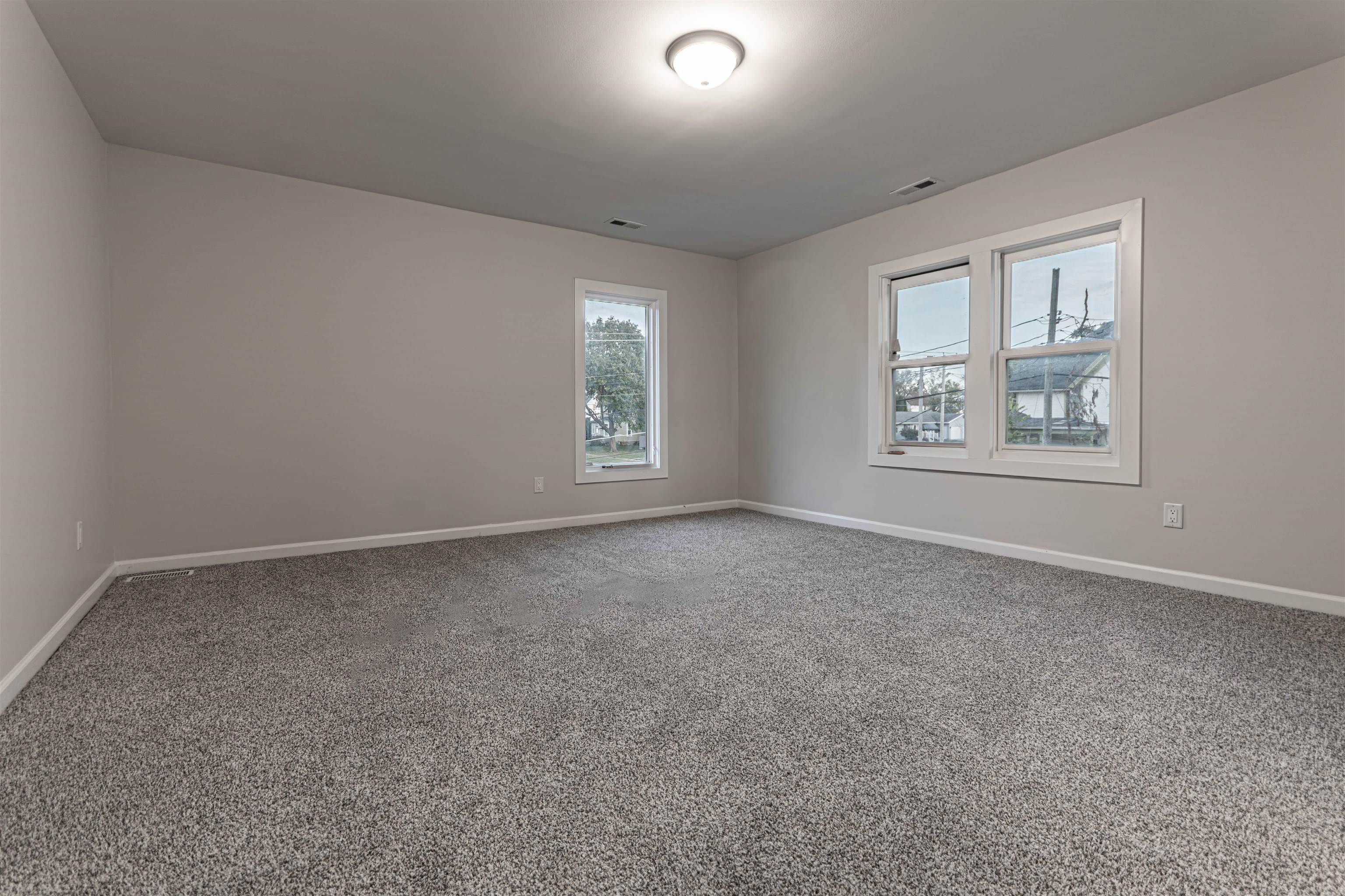 407 Allen Street Belvidere, IL 61008 - Photo 25 of 32 an empty room with windows