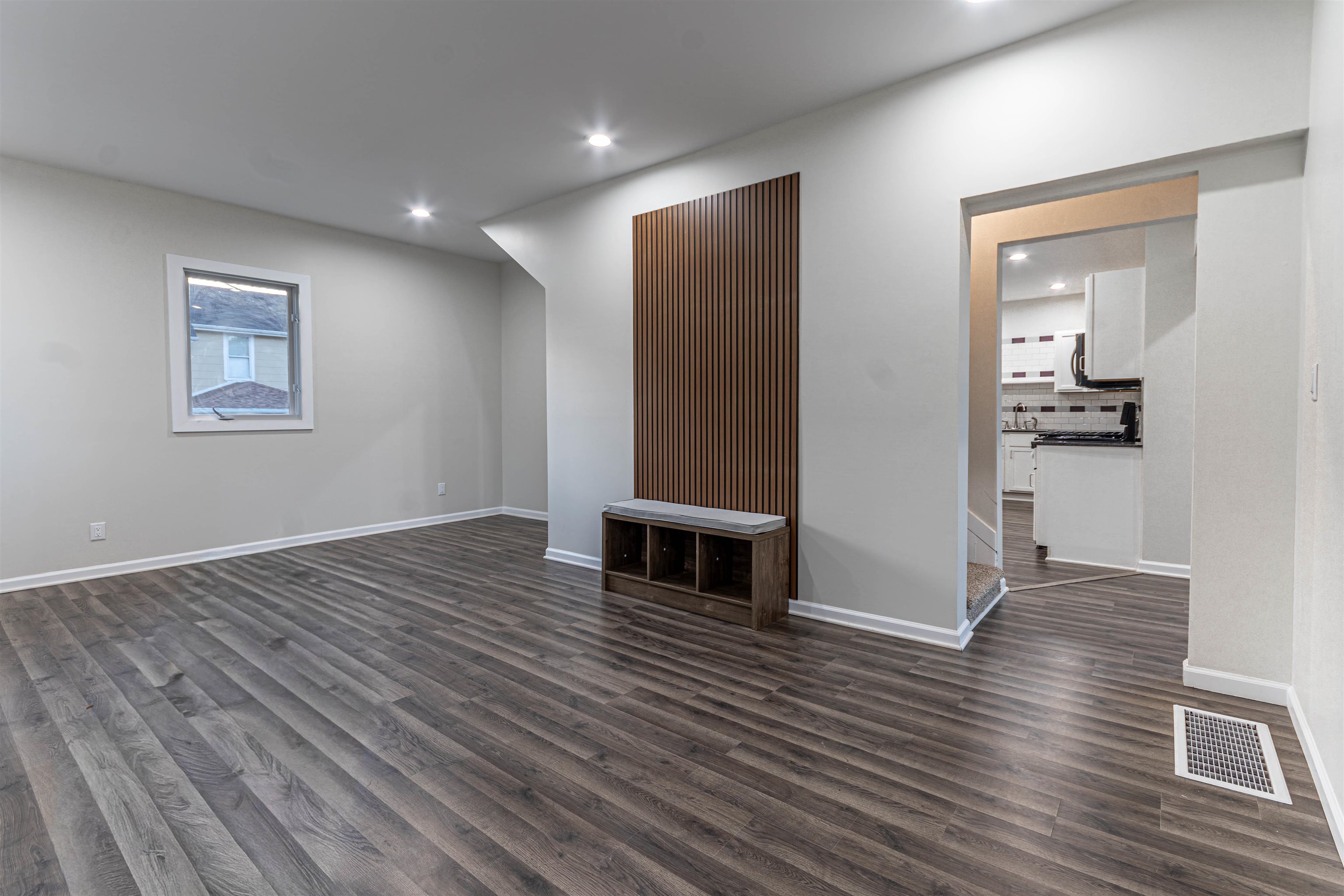 407 Allen Street Belvidere, IL 61008 - Photo 4 of 32 wooden floor in an empty room with a window