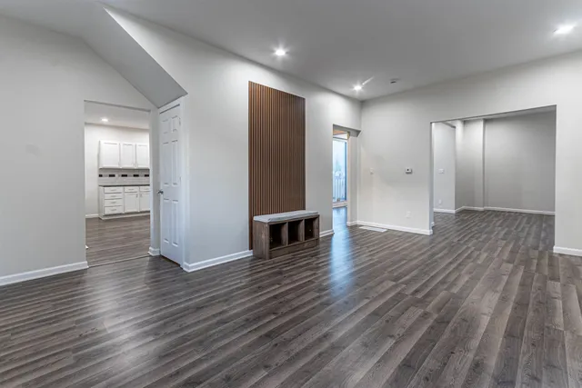 a view of a livingroom with wooden floor