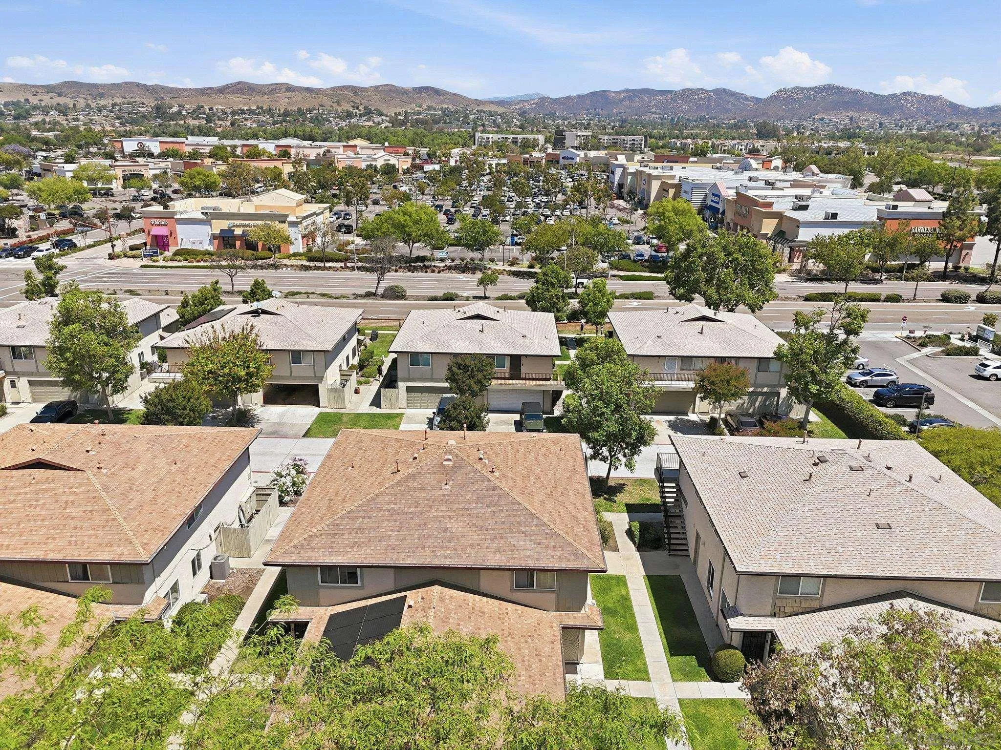 9926 Mission Vega Road, Unit 4 Santee, CA 92071 - Photo 27 of 30 an aerial view of residential house with outdoor space and mountain view