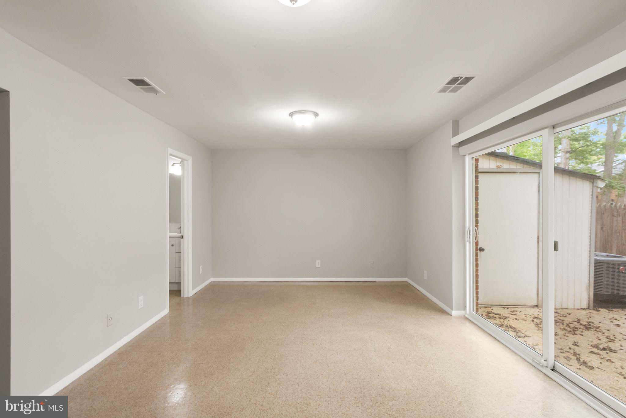 6611 Burlington Place Springfield, VA 22152 - Photo 26 of 41 a view of an empty room and a window