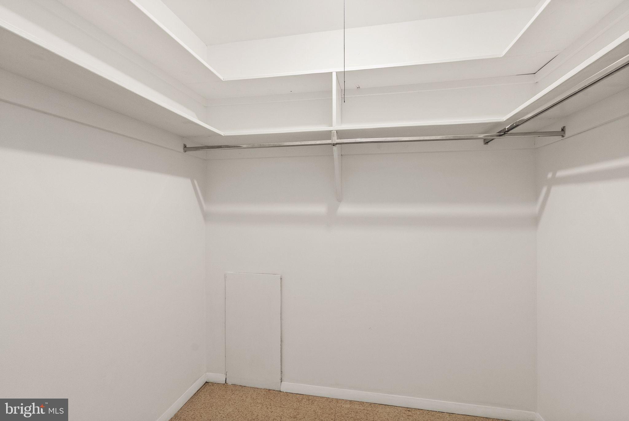 6611 Burlington Place Springfield, VA 22152 - Photo 30 of 41 a view of an empty walk in closet