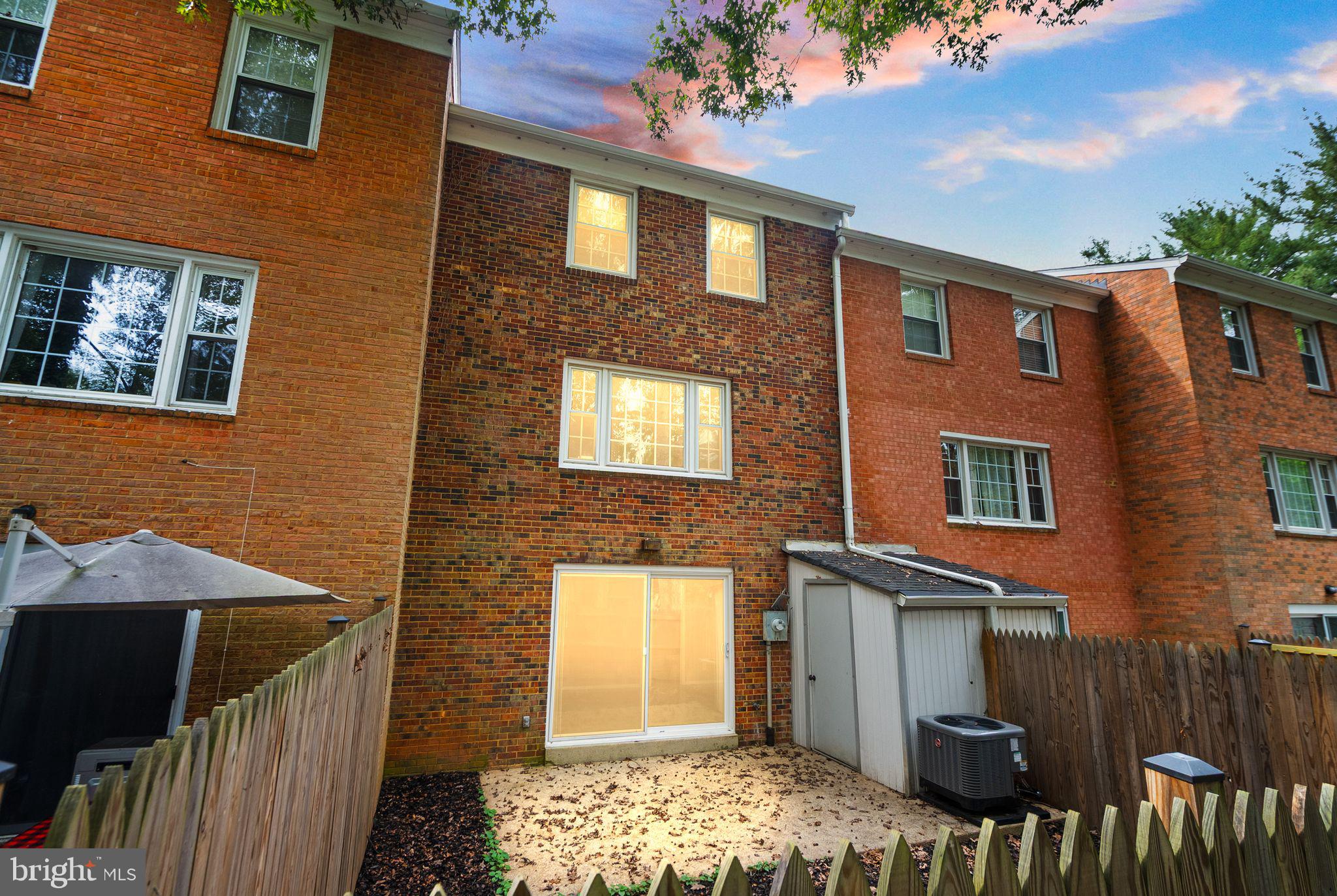 6611 Burlington Place Springfield, VA 22152 - Photo 34 of 41 a front view of a house with a yard