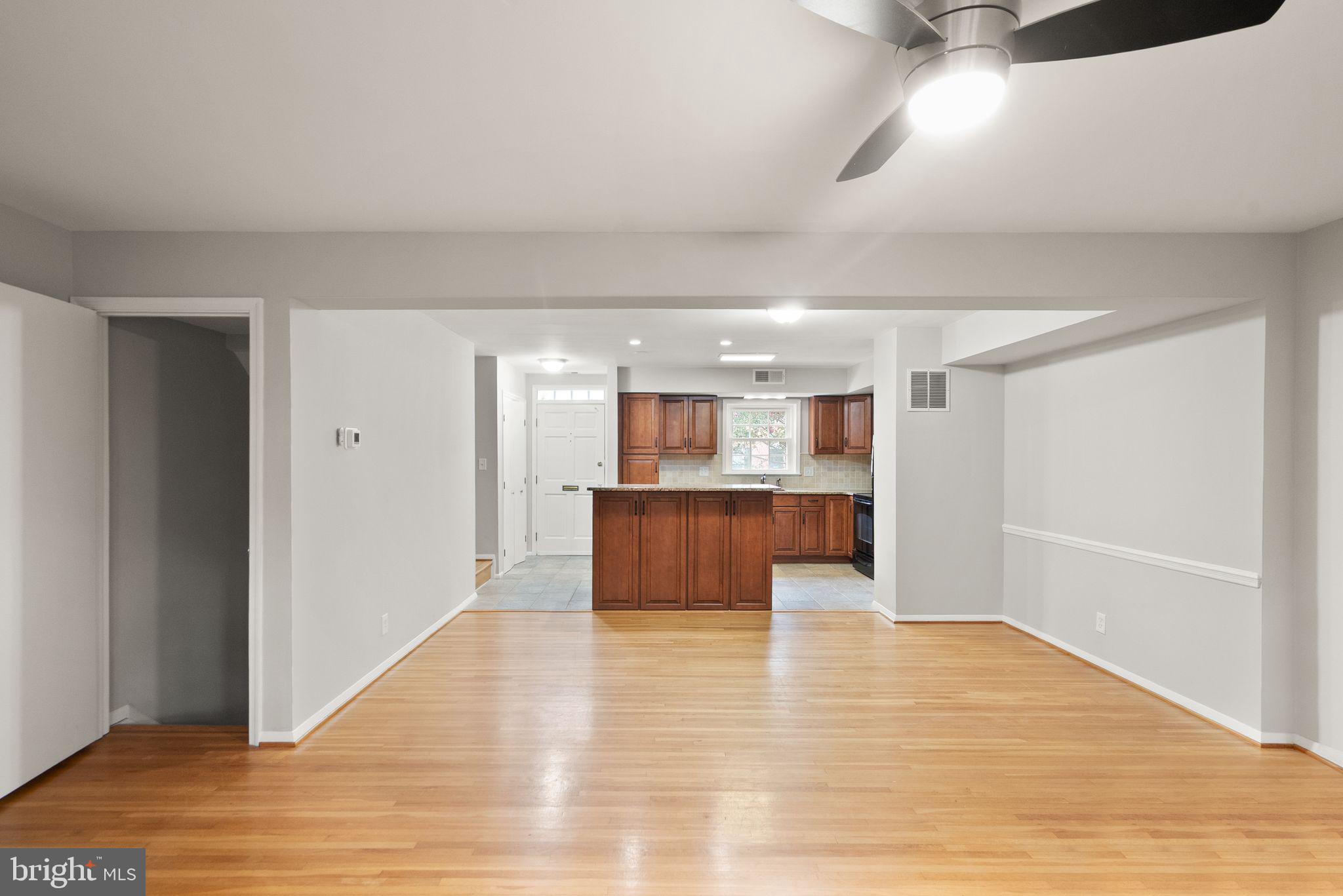 6611 Burlington Place Springfield, VA 22152 - Photo 10 of 41 a view of kitchen with wooden floor