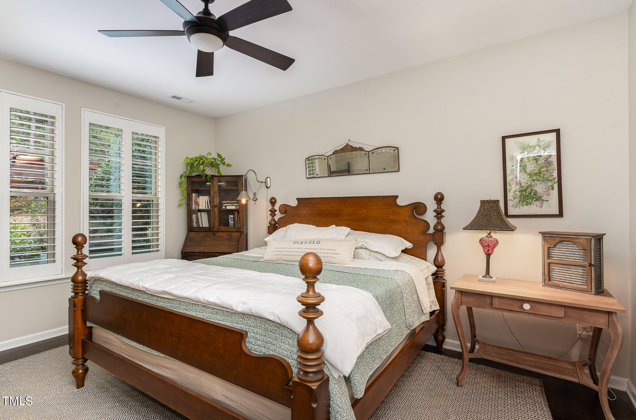 1308 Atticus Way Durham, NC 27703 - Photo 14 of 40 a bedroom with a bed and wooden floor