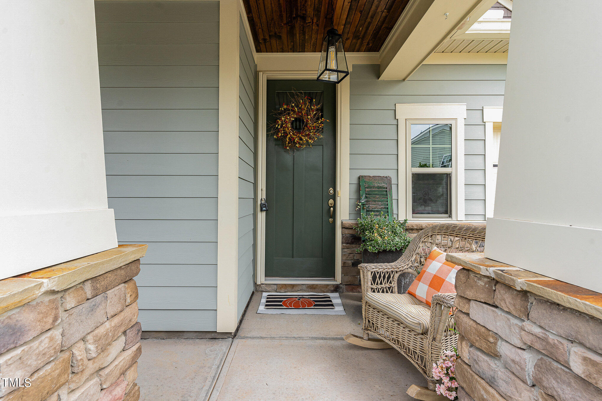 1308 Atticus Way Durham, NC 27703 - Photo 6 of 40 a building outdoor space with patio furniture and potted plants