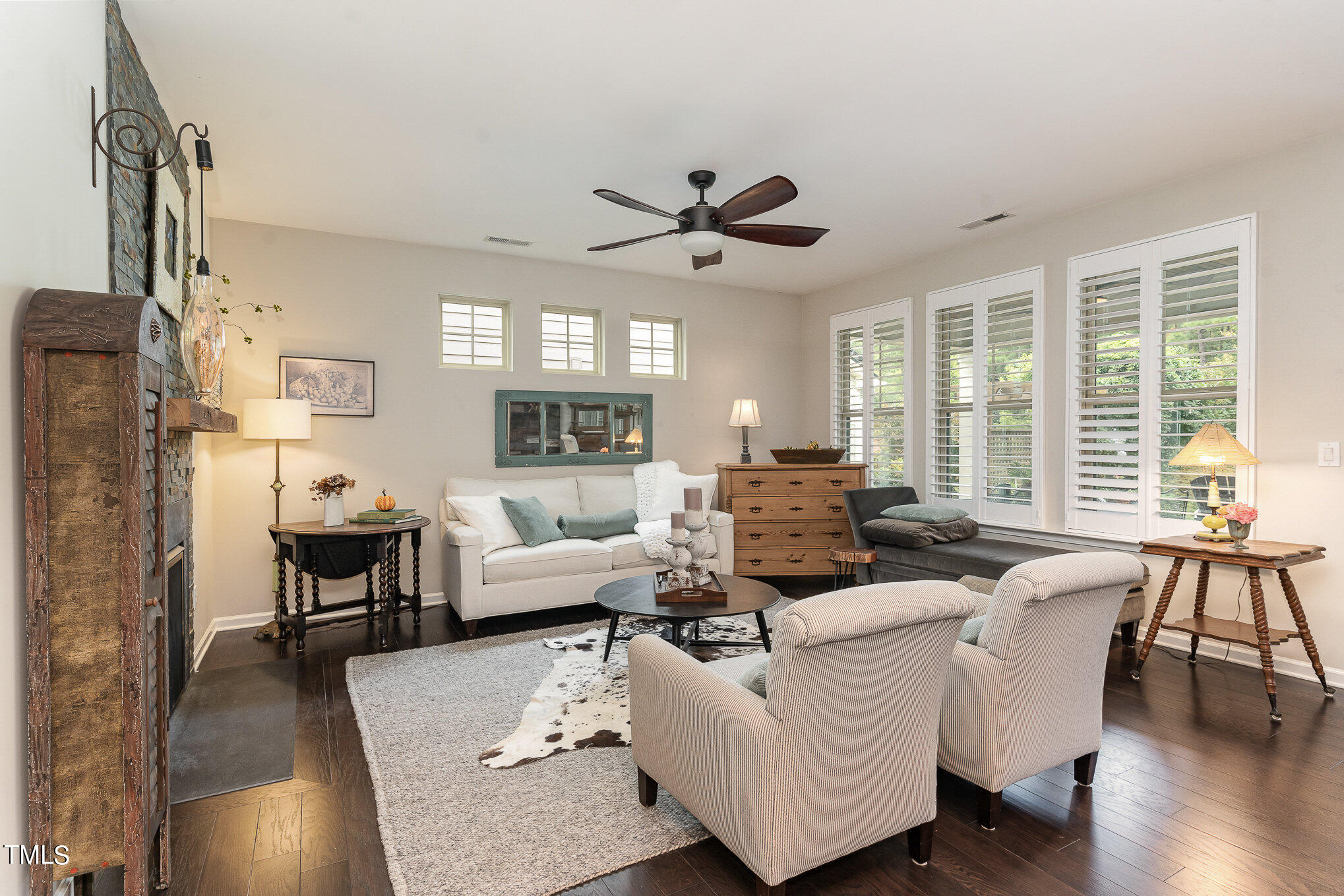 1308 Atticus Way Durham, NC 27703 - Photo 8 of 40 a living room with furniture wooden floor and a large window