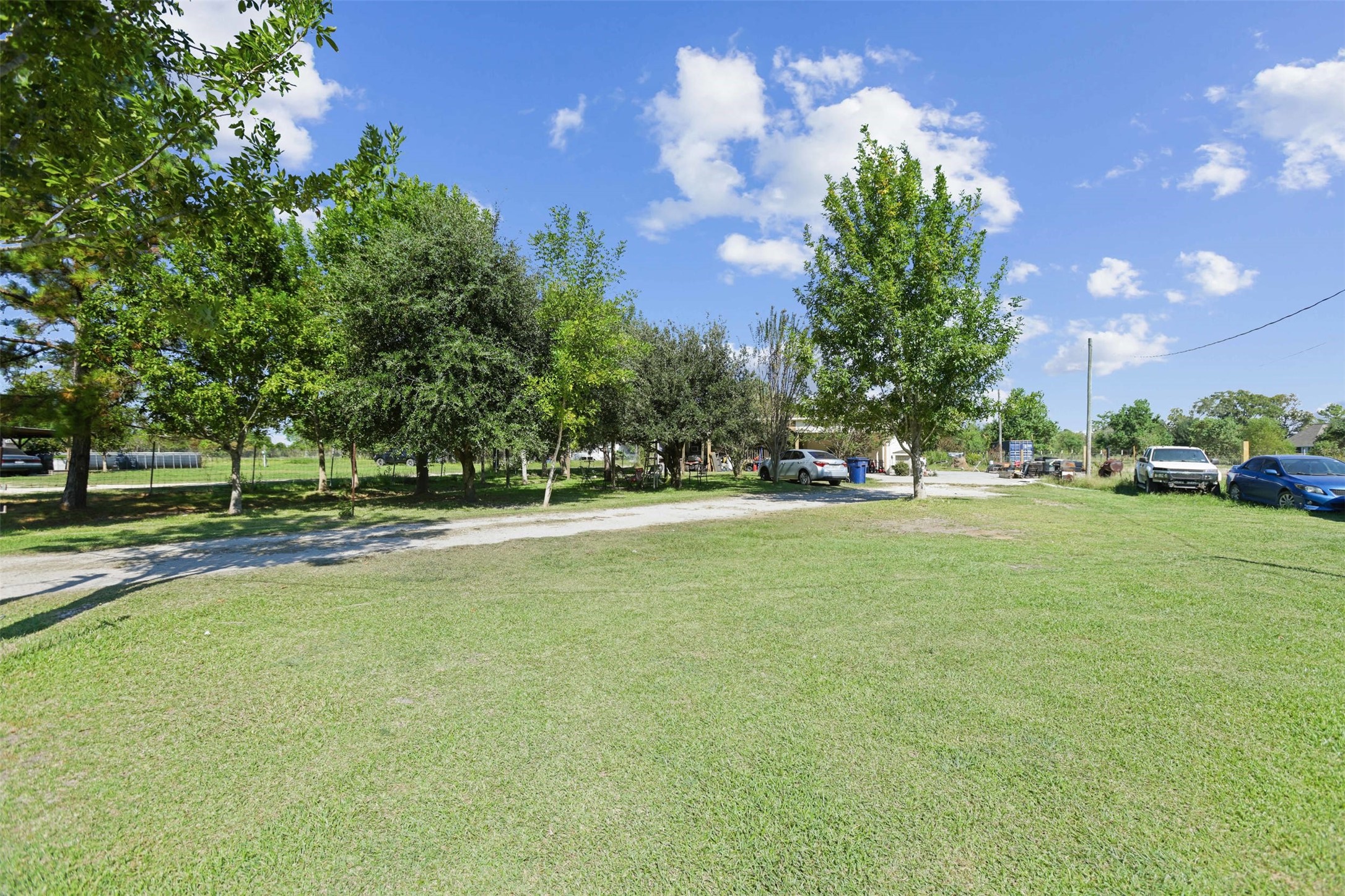 3805 Danek Road Crosby, TX 77532 - Photo 8 of 13 a view of outdoor space with garden and trees
