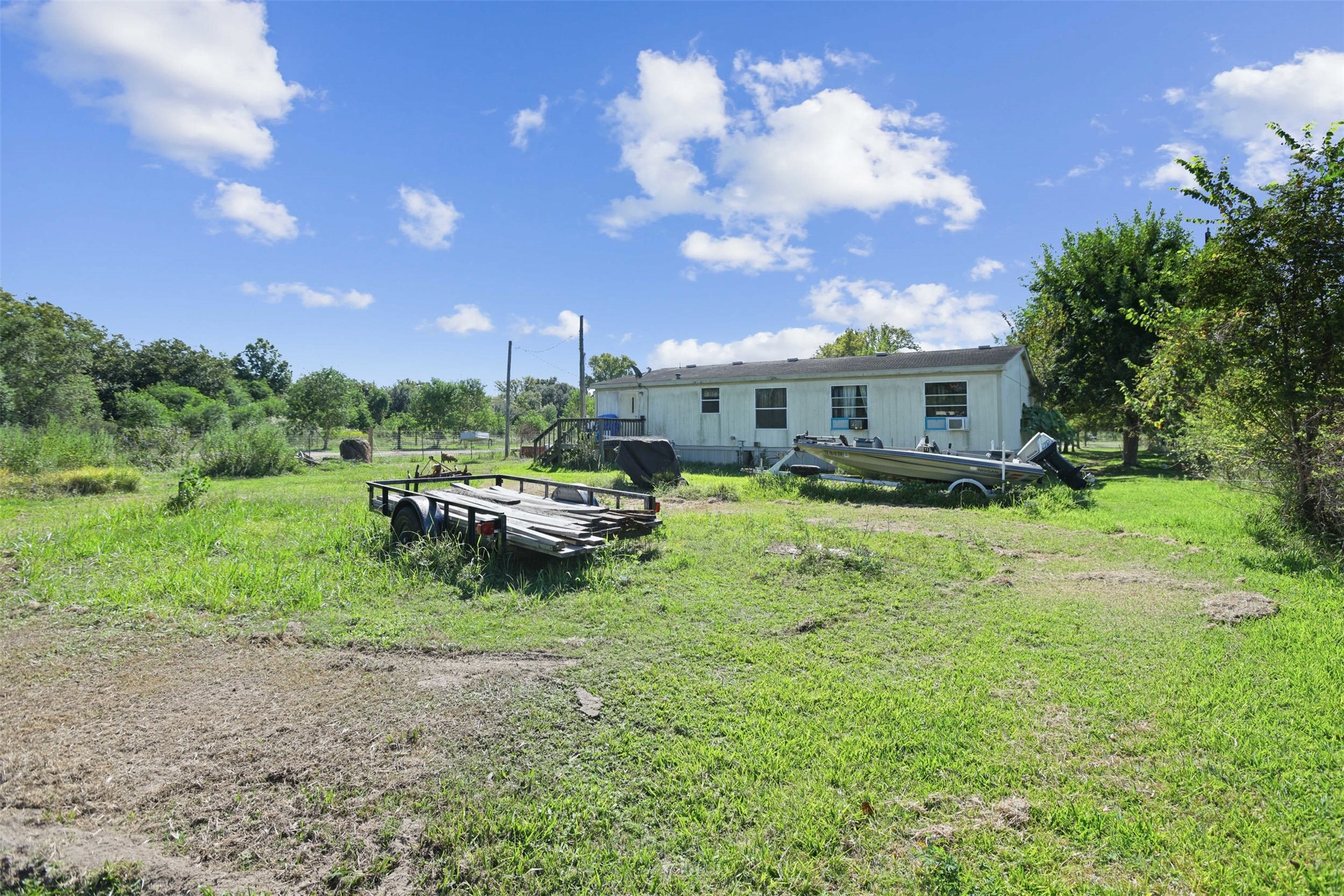 3805 Danek Road Crosby, TX 77532 - Photo 10 of 13 a view of a house with a yard and sitting area