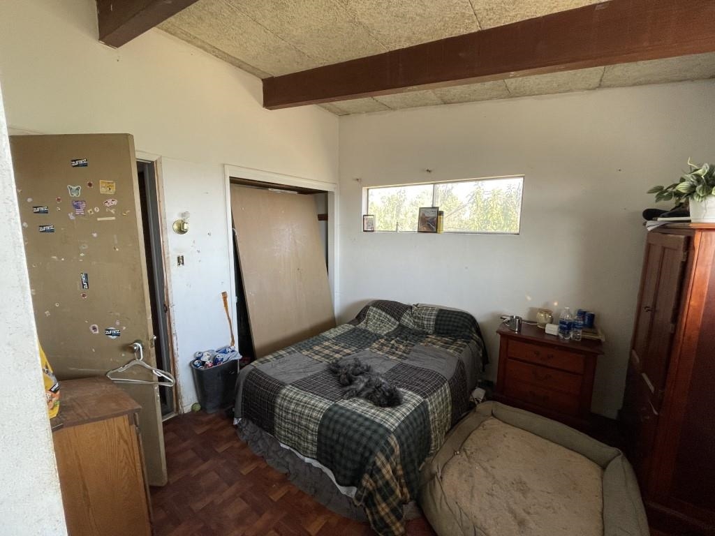 117 Easter Hill Drive Grand Junction, CO 81507 - Photo 9 of 21 a bedroom with a bed and furniture