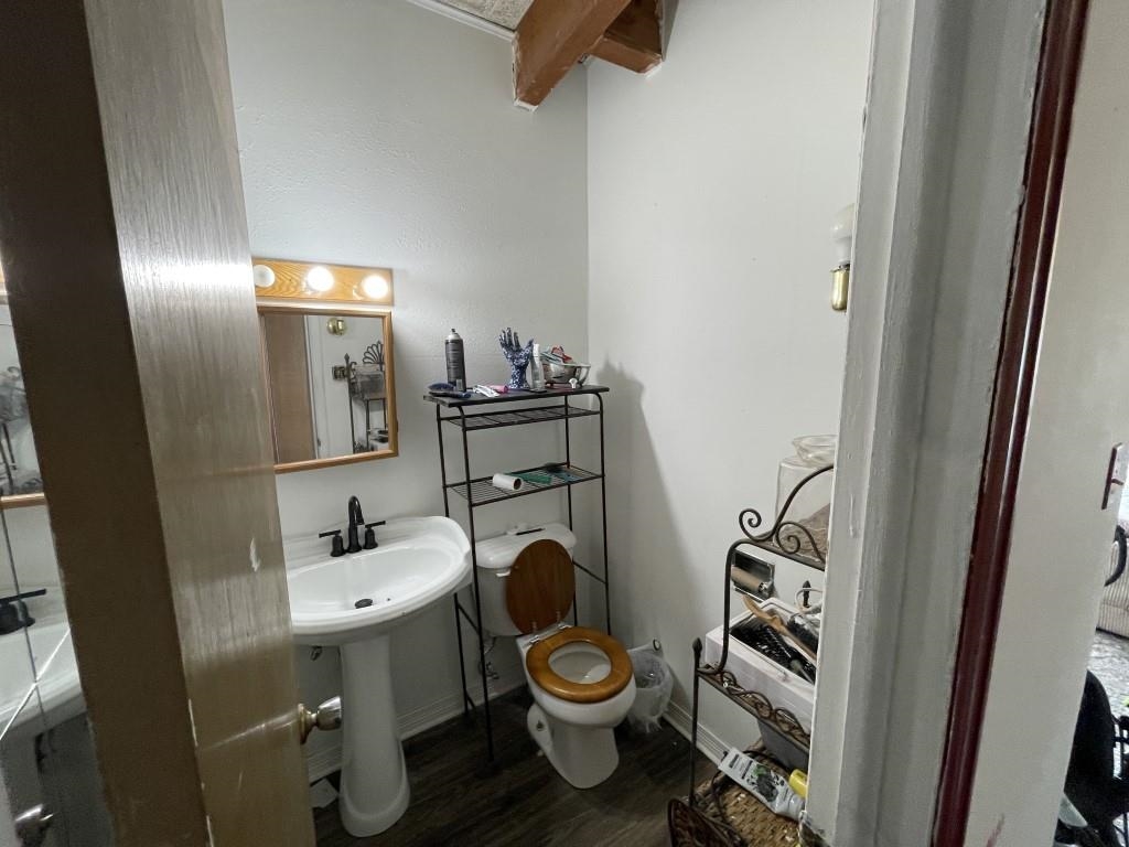 117 Easter Hill Drive Grand Junction, CO 81507 - Photo 10 of 21 a bathroom with a toilet a sink and mirror
