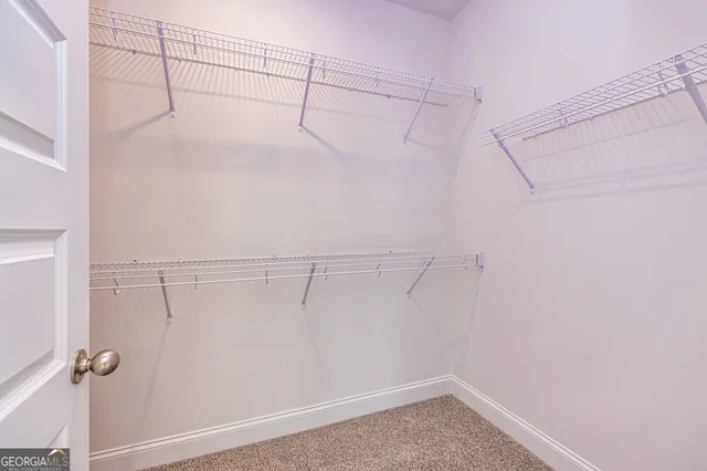 a view of a room with racks on the wall