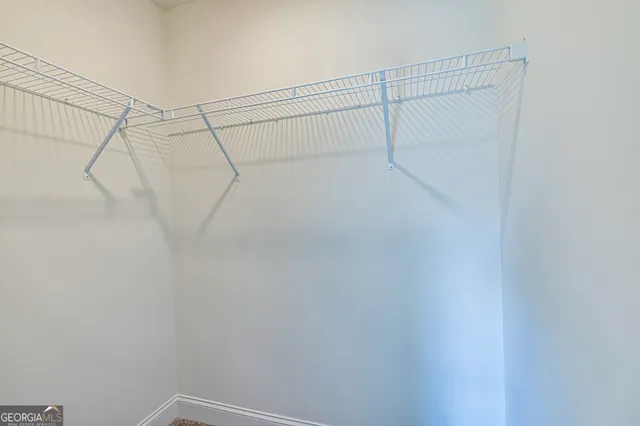 a bathroom with a granite countertop sink a toilet and a bathtub